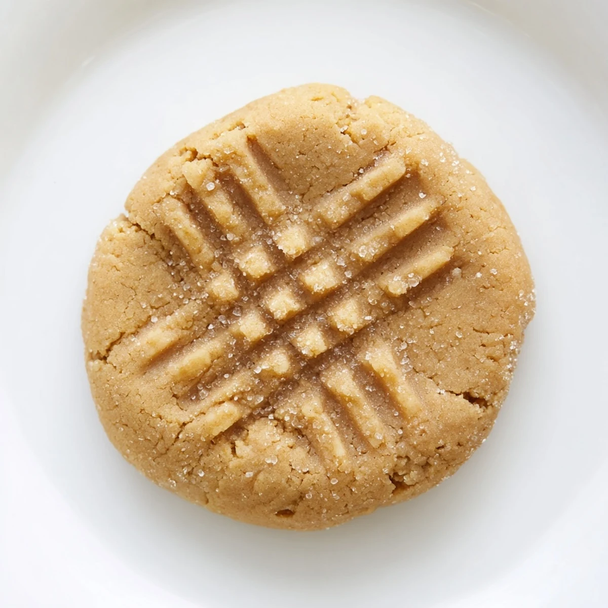 Perfectly chewy peanut butter cookies, boasting a deep golden brown with a fantastic peanut butter flavor.