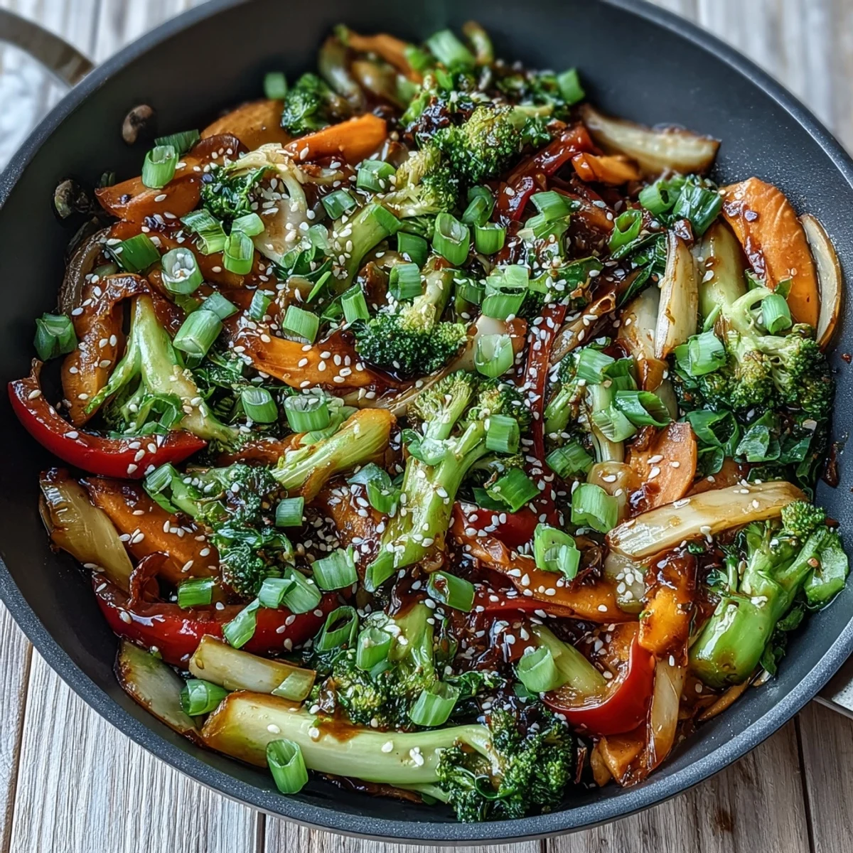 Vibrant winter vegetables and spicy kimchi shine in this comforting fermented veggie winter stir-fry, served hot with sesame seeds and green onions.