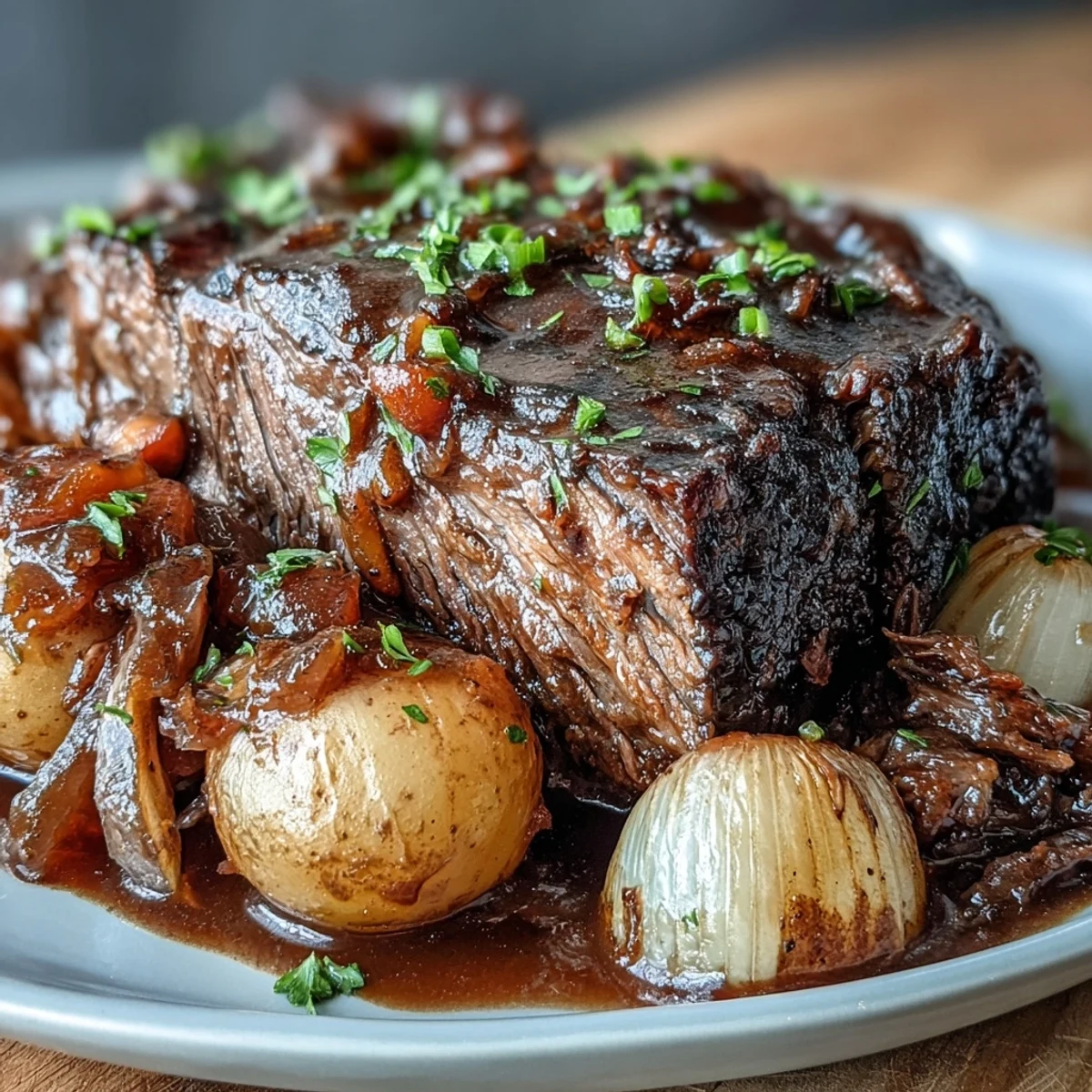 Savory onion soup mix slow cooker pot roast with tender beef and hearty vegetables in a rich, flavorful gravy.  