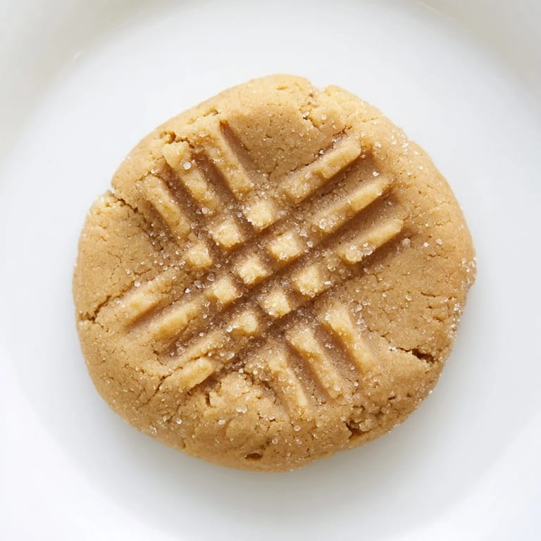 Perfectly chewy peanut butter cookies, boasting a deep golden brown with a fantastic peanut butter flavor.